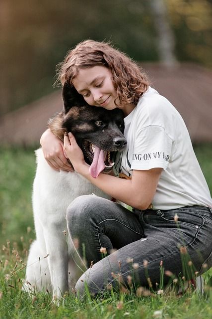 Cloudwhisker coat care specialist smiling in a soft studio portrait
